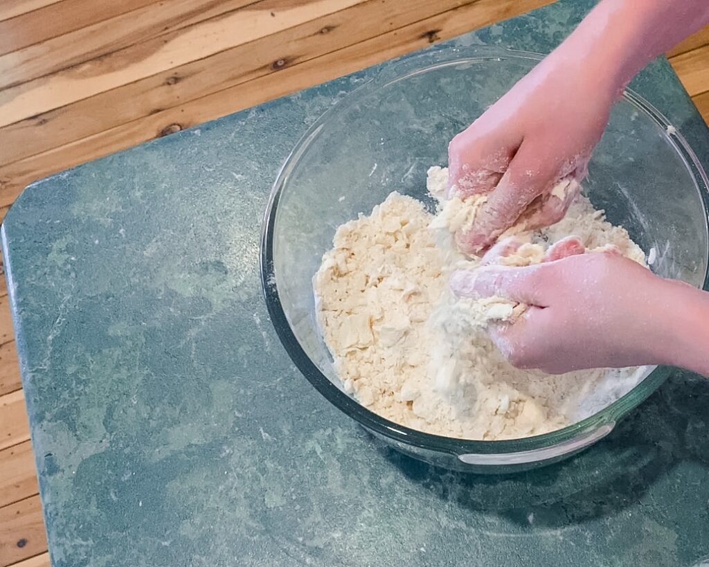 Rubbing in the butter for the sourdough tortillas