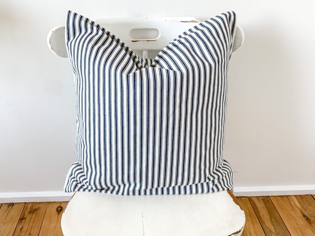 Easy to sew cushion cover in country blue mattress ticking pillow cover sitting on country kitchen chair